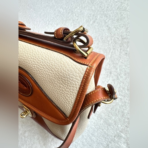Dooney & Bourke Vintage Crossbody Bag in Ivory and British Tan Classic - Picture 16 of 17